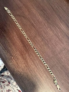 10 Karat gold figaro bracelet