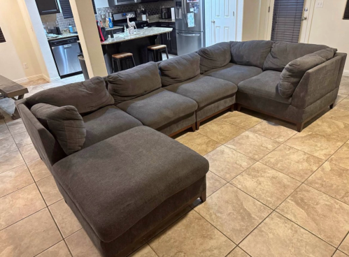 Grey sectional couch.