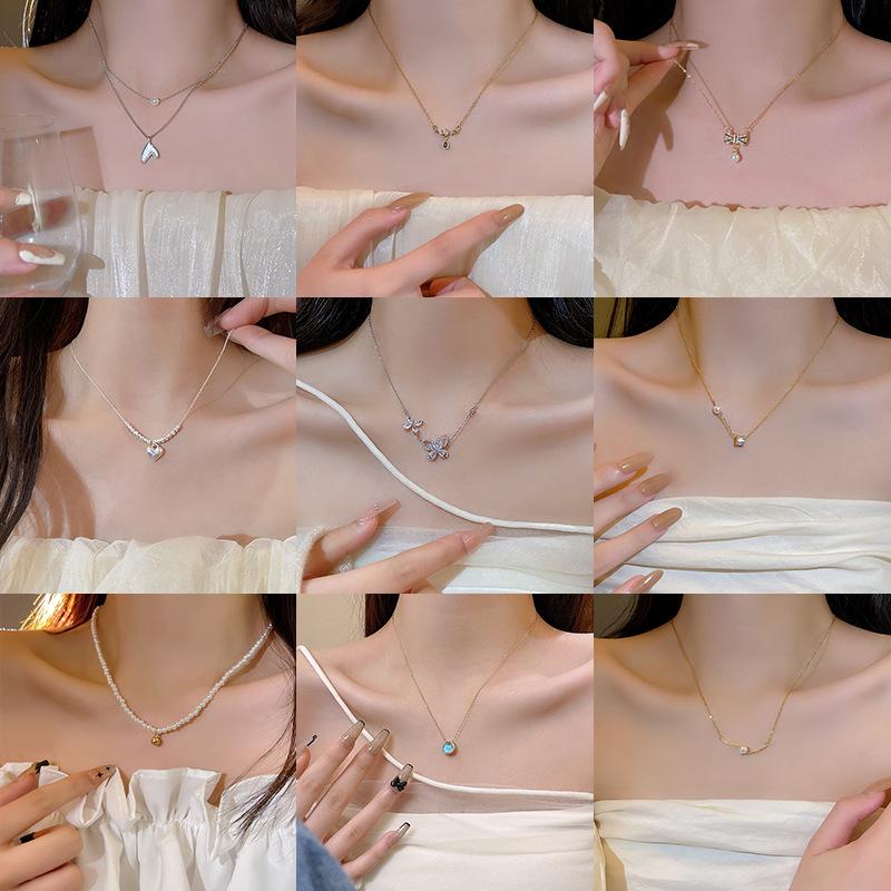 South Korea New Light Luxury Niche Titanium Steel Necklace Women's Advanced Design Zircon Bow Cla…